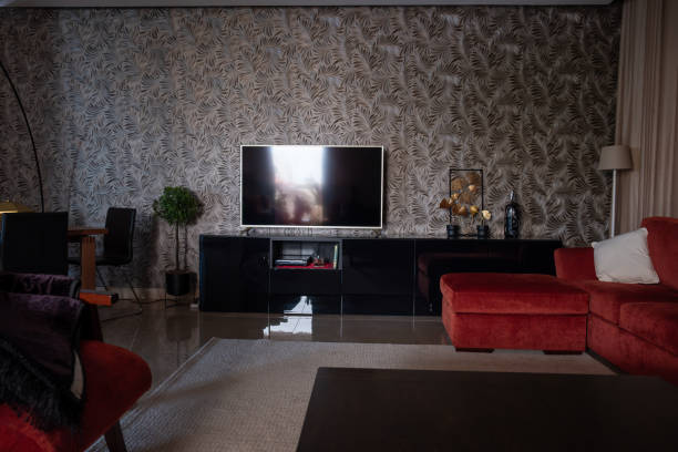 istock Modern Living Room with Stylish Wallpaper and Red Sofa 2182316737