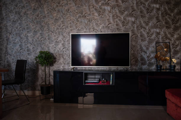 istock Modern Living Room with Stylish Wallpaper and Red Sofa 2182316739