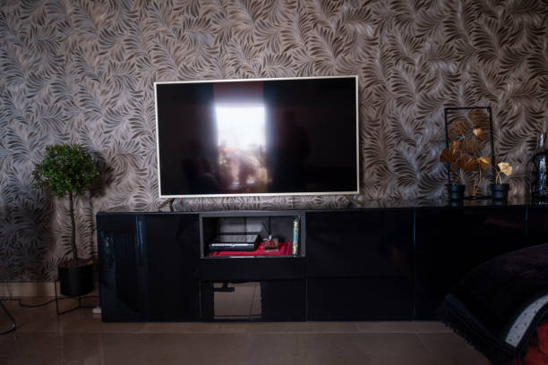 istock Modern Living Room with Stylish Wallpaper and Red Sofa 2182316740