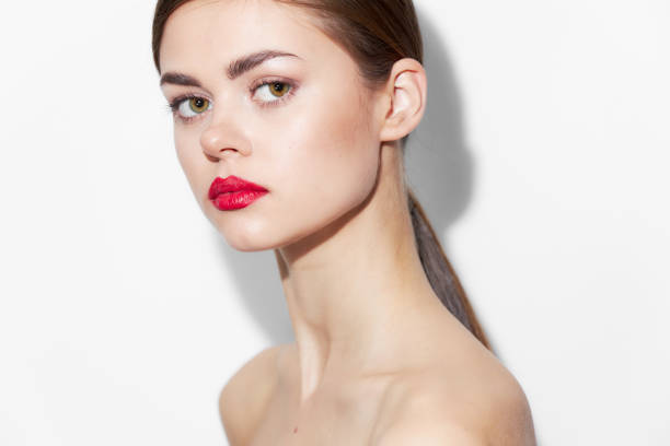 istock Model Nude shoulders red lips attractive look luxury bright makeup 2182325066
