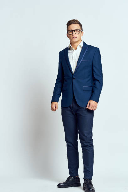istock business man in suit wearing glasses self-confidence manager executive light background 2182325161
