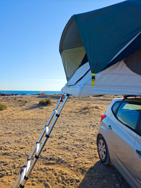 istock car tent on the beach 2182326108
