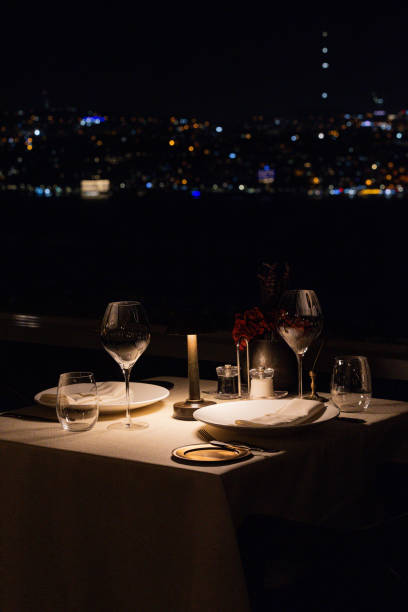 istock Night view of Istanbul Bosphorus Bridge seen from a luxurious restaurant with moonlit sky, Turkey 2182329078