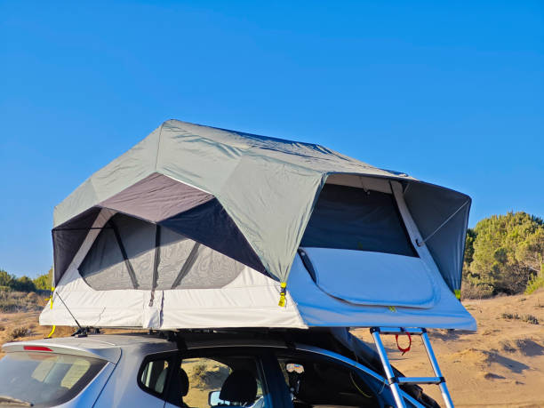 istock car tent on the beach 2182330097