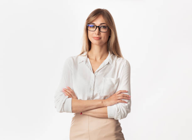 istock Businesswoman Smiling At Camera Crossing Hands Posing, Studio Shot 2182332474