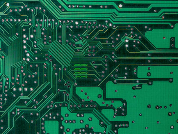 istock Close-up of a printed circuit board with chips, showing the complex connections and electronics parts 2182333842