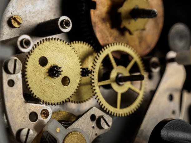 istock Close-up of a mechanical device with gears and teeth, demonstrating the complexity of repairing and assembling a watch movement 2182334036