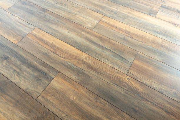 istock Natural wood laminate parquet floor background 2182334840