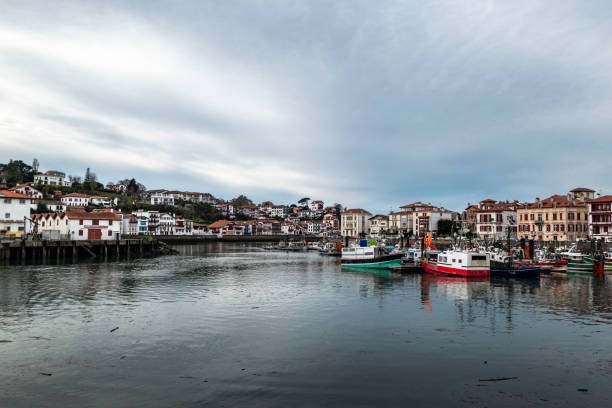 Fishing  boats in Portosín harbor at dusk, A Coruña province, Galicia, Spain.
