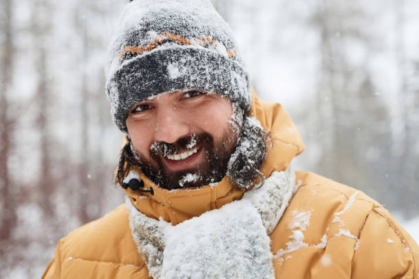 istock Portrait of Snow Covered Man Smiling 2182339601