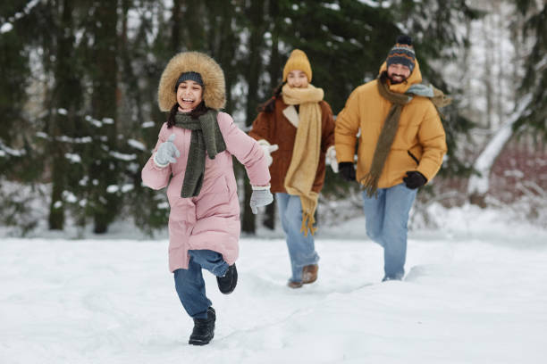 istock Girl Running Towards Camera in Winter Forest 2182339684
