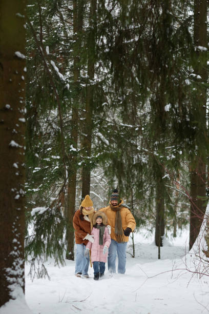 istock Happy Family in Beautiful Winter Forest 2182339706
