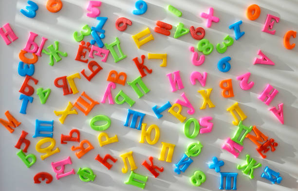 istock multi-colored plastic letters of Russian alphabets and numbers 2182347933