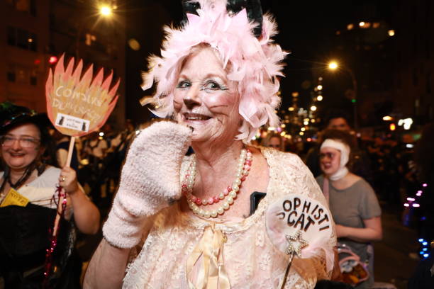 Reverlers dressed as cats march during the New Yorks 51st Annual Village Halloween Parade in New York, N.Y., Thursday, Oct. 31, 2024. (Photo: Gordon Donovan)