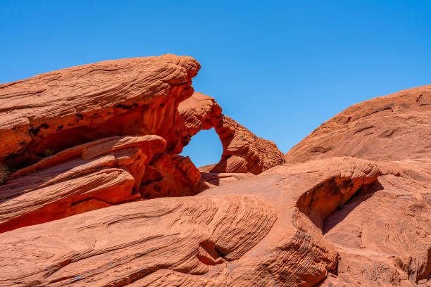 The Beehives rock formations in Valley of Fire State Park, Nevada, USA. Distinctive dome-shaped sandstone formations rise from the desert landscape.