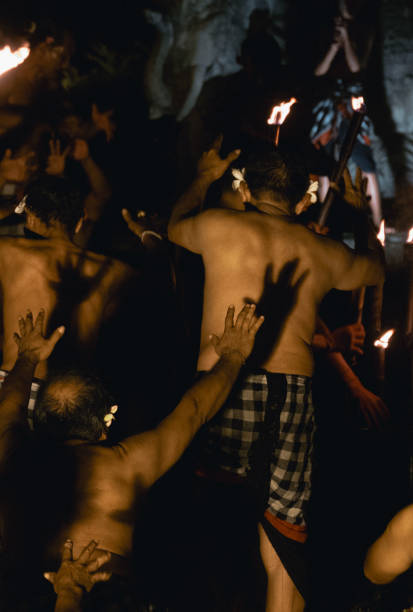 Ubud Bali, Indonesia - October 18, 2024: Kecak dance is a traditional ritual of Bali，also known as the Ramayana Monkey Chant, it is a retelling of a great battle from the Ramayana of Hindu lore. It's a ticketed free performance at a square in Ubud.