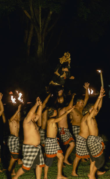 Ubud Bali, Indonesia - October 18, 2024: Kecak dance is a traditional ritual of Bali，also known as the Ramayana Monkey Chant, it is a retelling of a great battle from the Ramayana of Hindu lore. It's a ticketed free performance at a square in Ubud.