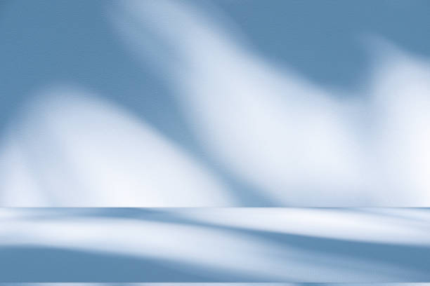 istock Studio style background wall decoration presentation uses white and blue tones. with shadows cast from a nearby window, concept creating a decorative 2182392508
