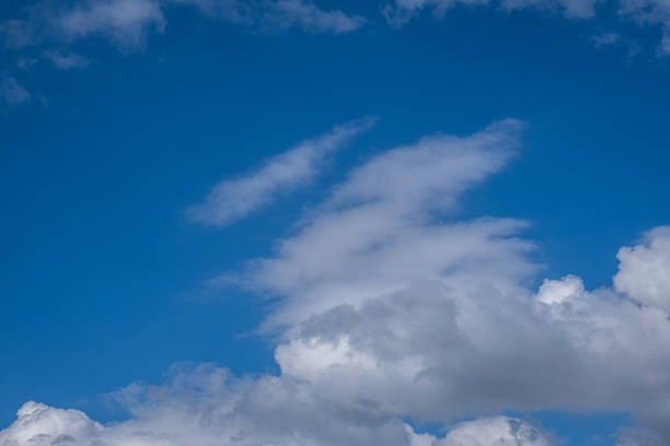 istock white clouds in the blue sky. cumulus. 2182395172