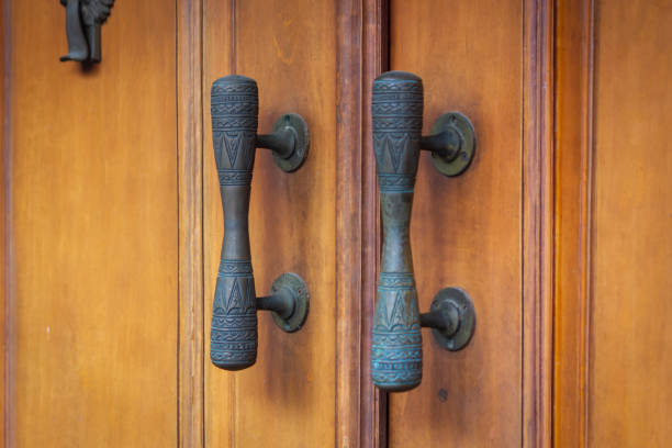 istock Metal handle on wooden door 2182395358