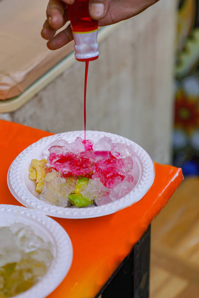 Garut's signature mixed ice is being given syrup to make it look more attractive