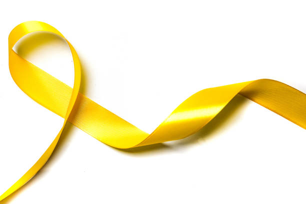 istock yellow ribbon isolated on white background 2182399871