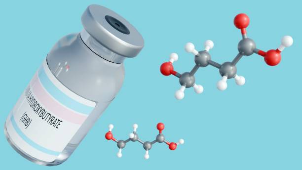 istock Gamma-hydroxybutyrate molecules and a small vial with label 2182409095