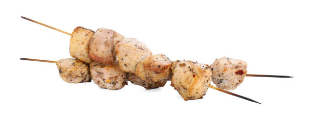 istock Skewers with delicious fresh shish kebabs isolated on white 2182409448