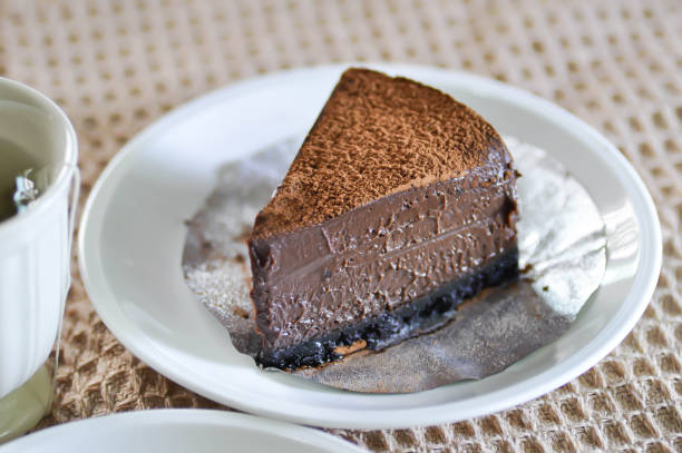 istock chocolate cake and hotn tea on the table 2182412047