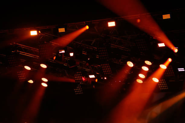 Stage multicolored lighting is hang under the roof
