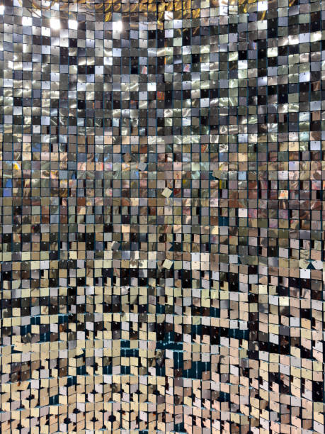 istock A wall of shiny silver tiles with a pattern of squares 2182416664