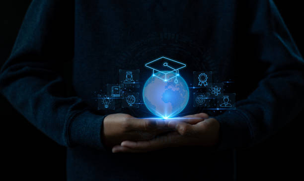 istock A person holds a glowing globe symbolizing global education and innovation in a dark environment, highlighting modern learning. 2182418392