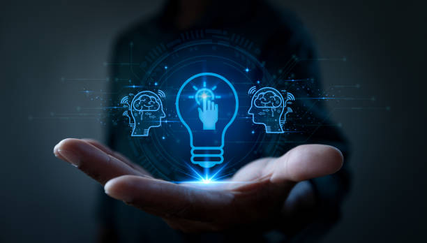 istock A hand reaching out with a glowing light bulb, symbolizing innovation, creativity, and the connection between ideas and technology. 2182418399