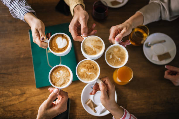 istock Top view of group of people drinking coffee. 2182421015
