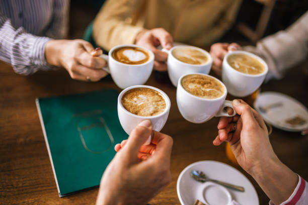 istock Top view of group of people drinking coffee. 2182421017