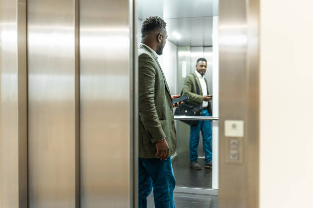istock Focused Black Male Professional Entering Office Building 2182422441