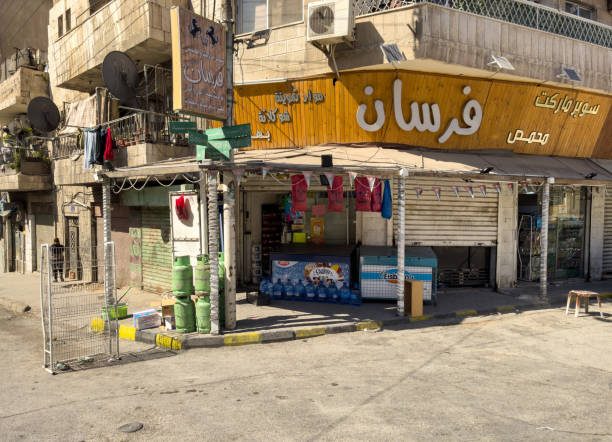 view of a small supermarket in the streeets of Amman duirng the Day in Summer