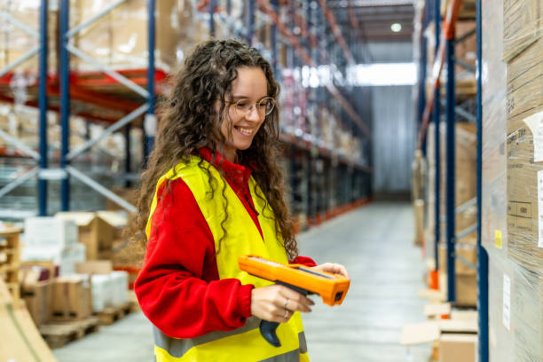 istock Woman scanning products in a distribution warehouse 2182429473