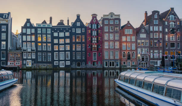 istock Autumn reflections in Amsterdam's canals highlight its historic architecture 2182430396