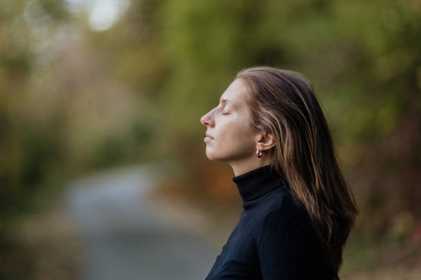 istock Young woman finding peace and connecting with nature 2182430804