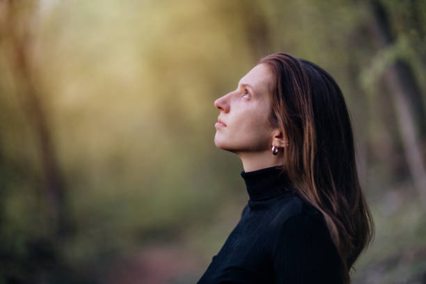 istock Young woman finding peace and connecting with nature 2182430805
