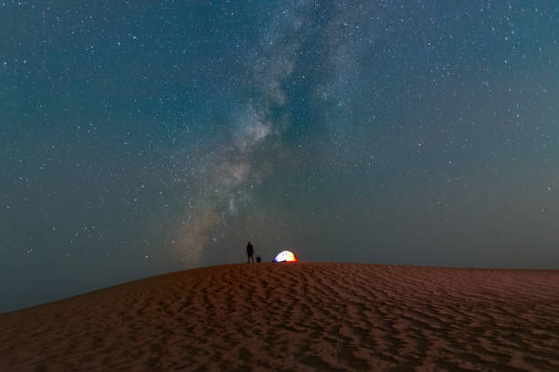 istock Stars milky way at desert sand dune 2182436512
