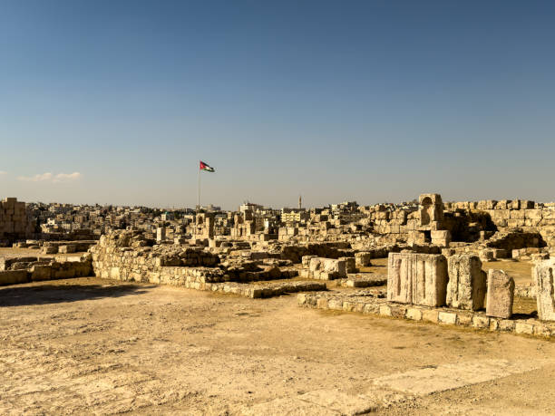an Overview of amman capital suburb Jordan with a big Jordanian Flag