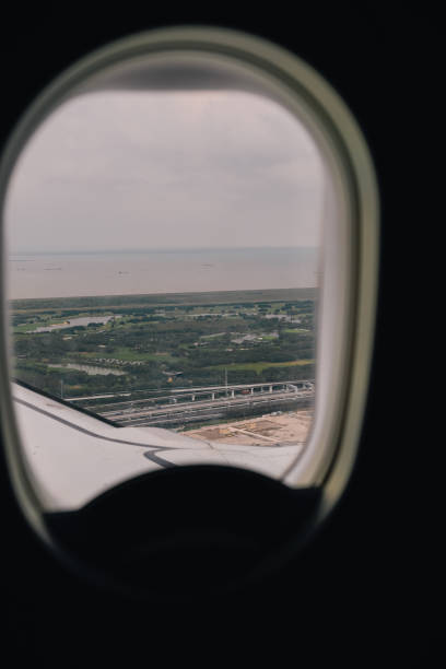 istock View from airplane window before landing in Shanghai 2182437999