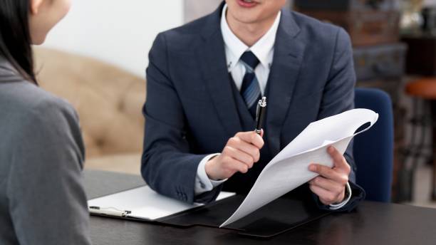 istock The hands of a businessman blaming his subordinate 2182439087