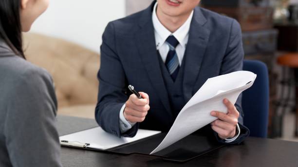 istock The hands of a businessman blaming his subordinate 2182439088