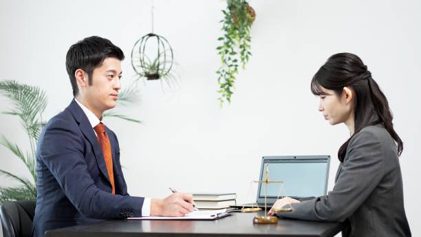 istock Lawyer receiving consultation regarding problems 2182439228