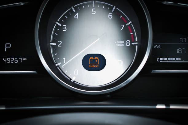 istock Car battery warning light blinking on odometer dashboard of car 2182440934