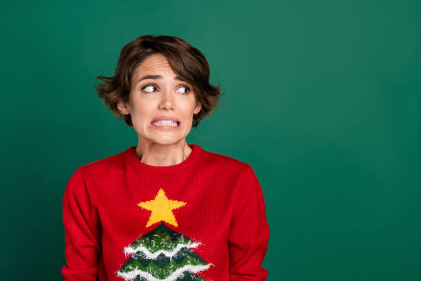 istock Close up photo of prety girl uglu pullover looking empty space oops make problem excuse isolated on bright yellow color background 2182446551