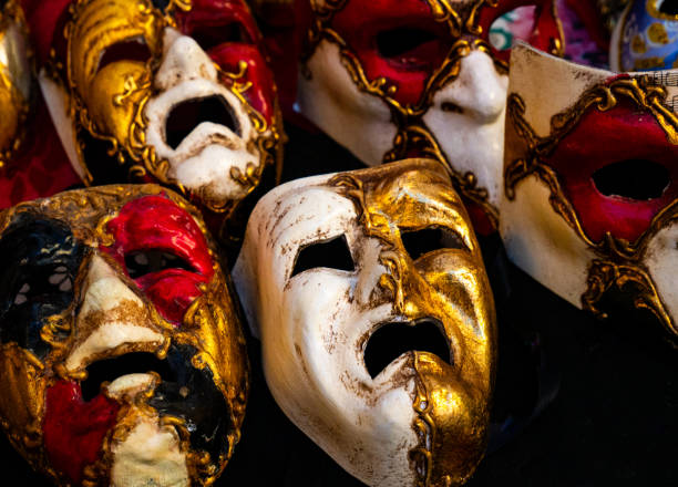 istock exhibition of colorful Venetian masks with a sad and dejected expression. 2182448191